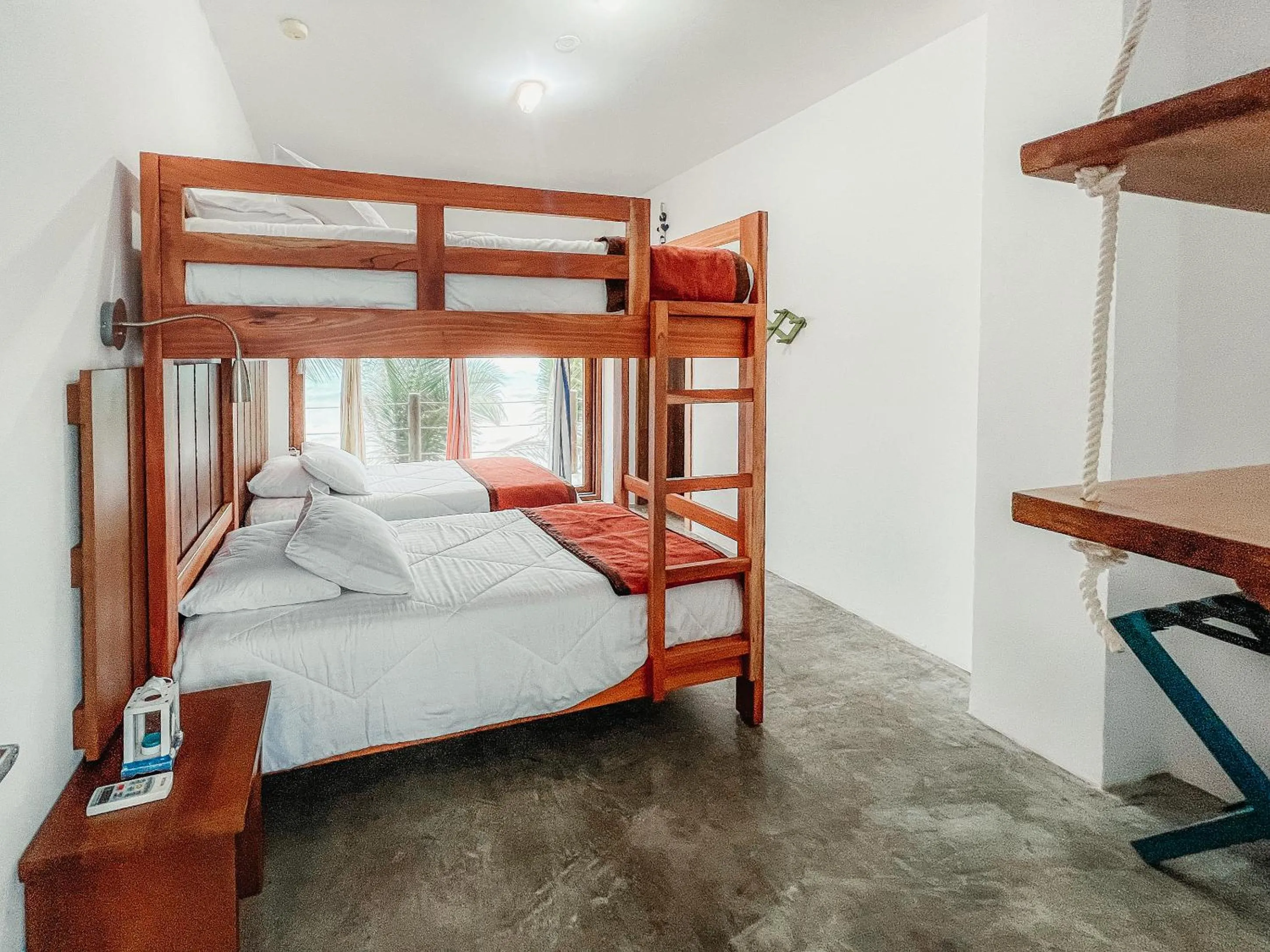 Bed in Mi Playa Galapagos Beachfront Apartments