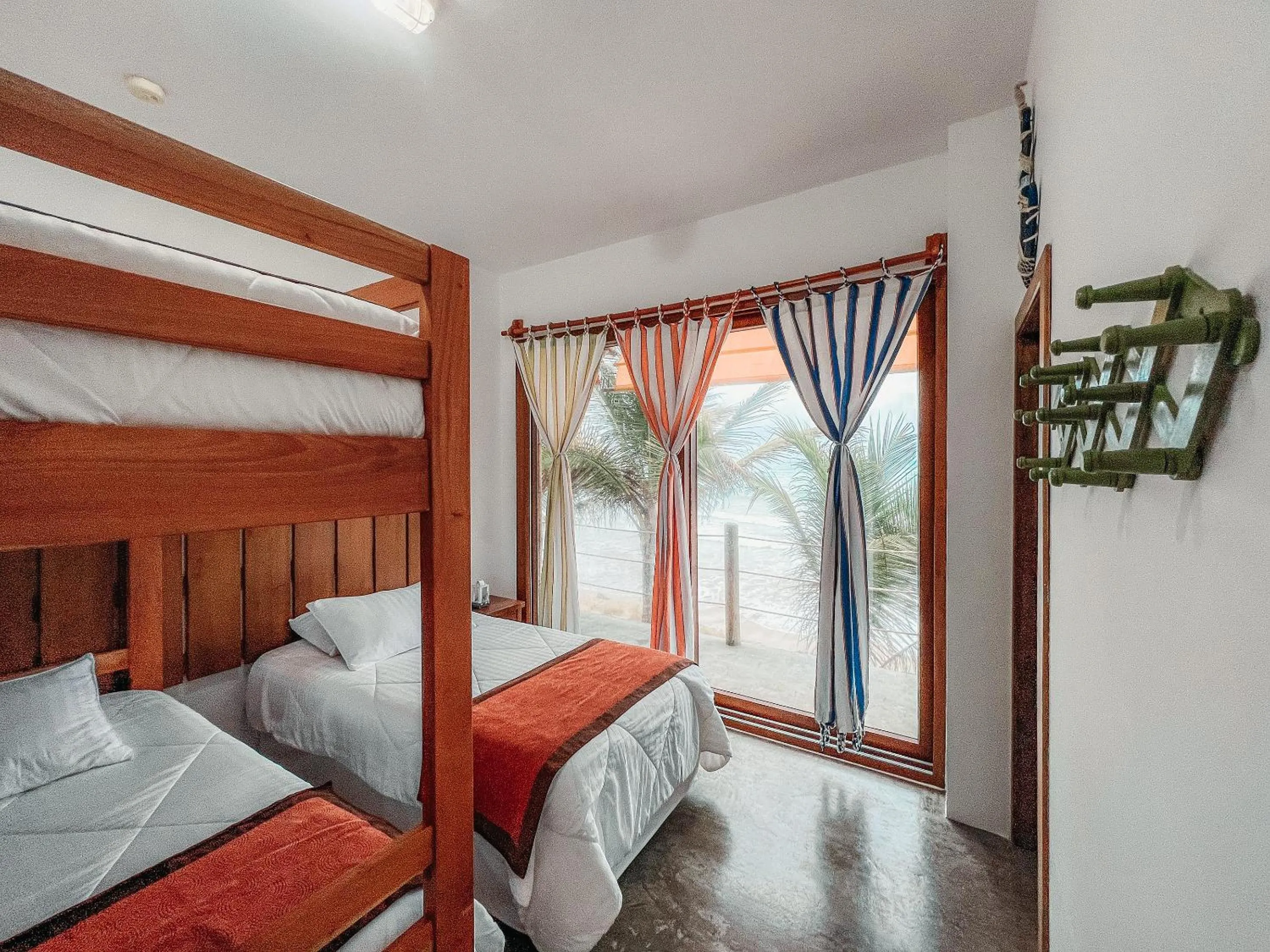 Bed in Mi Playa Galapagos Beachfront Apartments