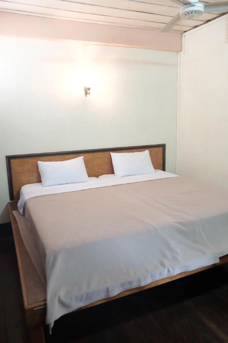 Bed in Manilath guesthouse