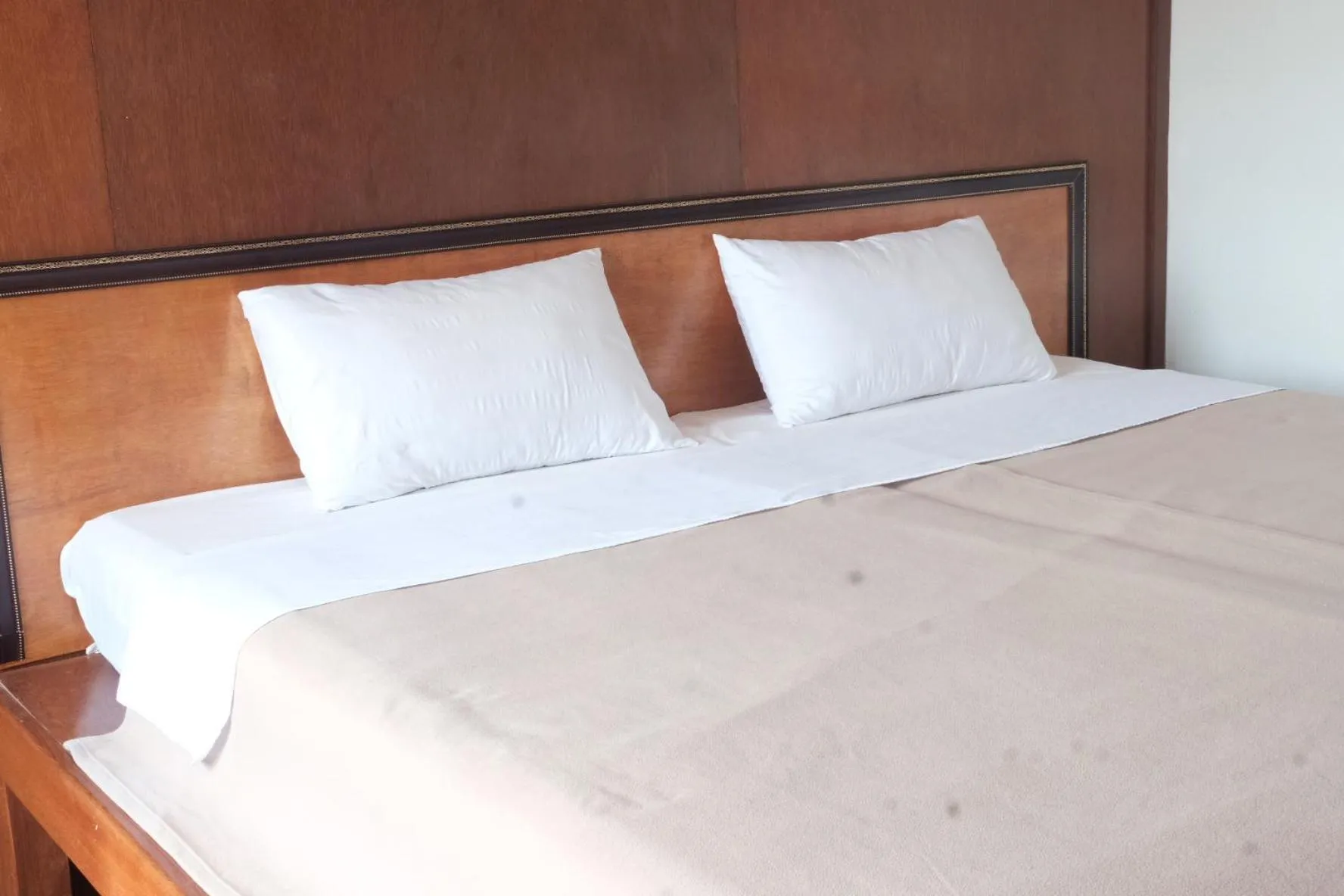 Bed in Manilath guesthouse