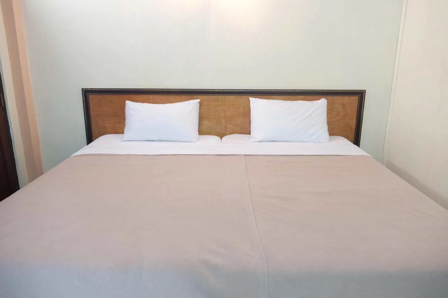 Bed in Manilath guesthouse