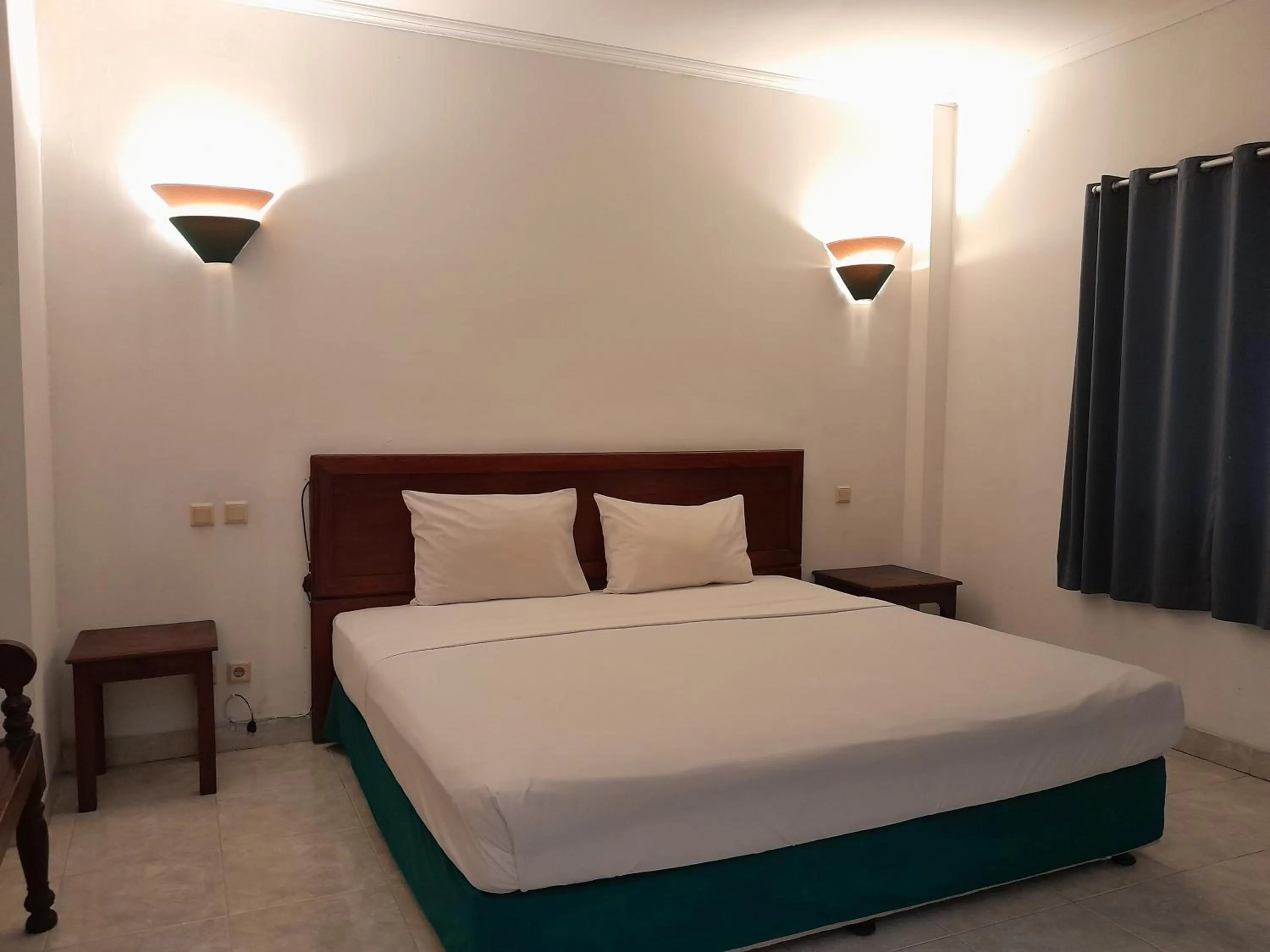 Bedroom in The Green Winotosastro Hotel Yogyakarta