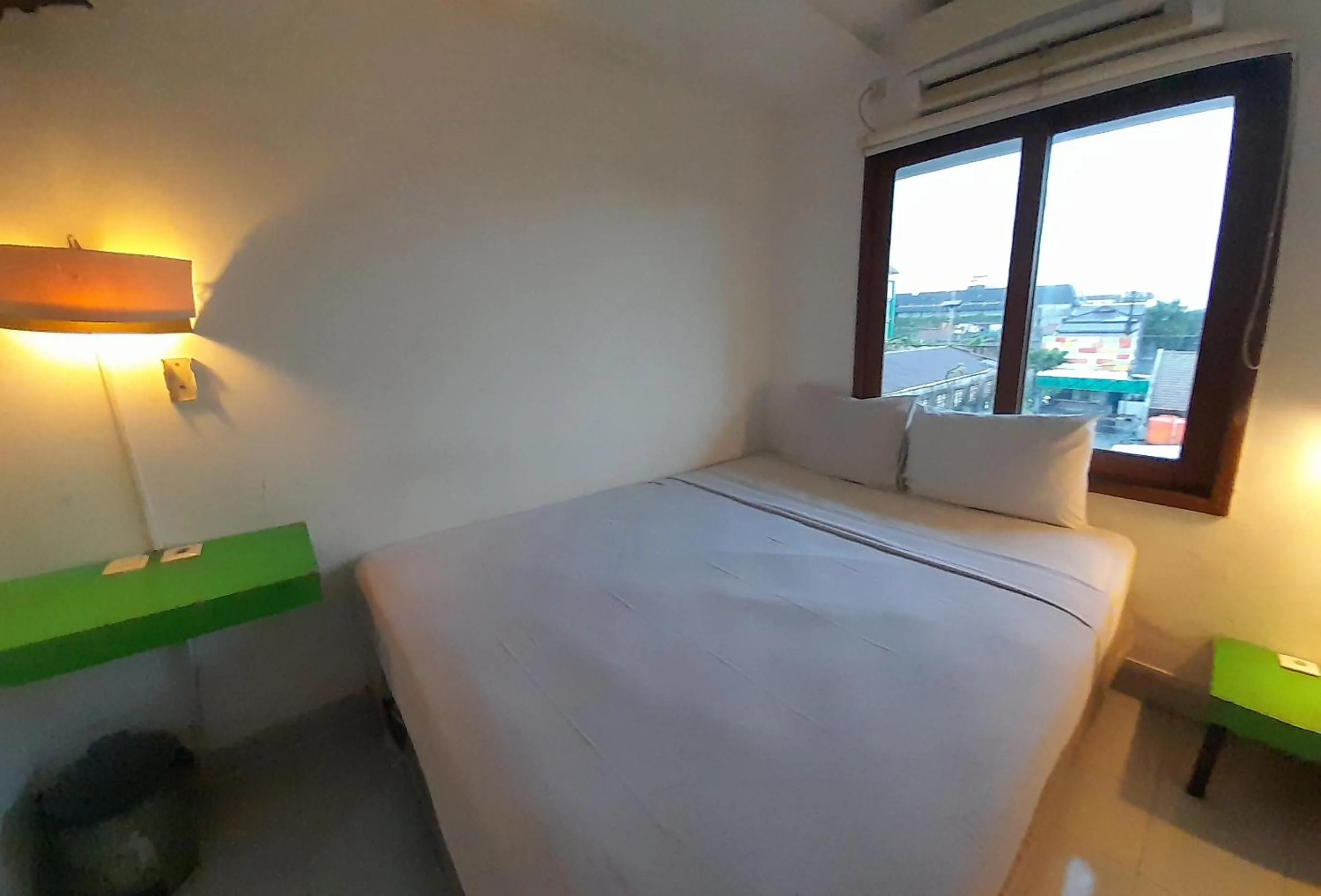 Bed in The Green Winotosastro Hotel Yogyakarta