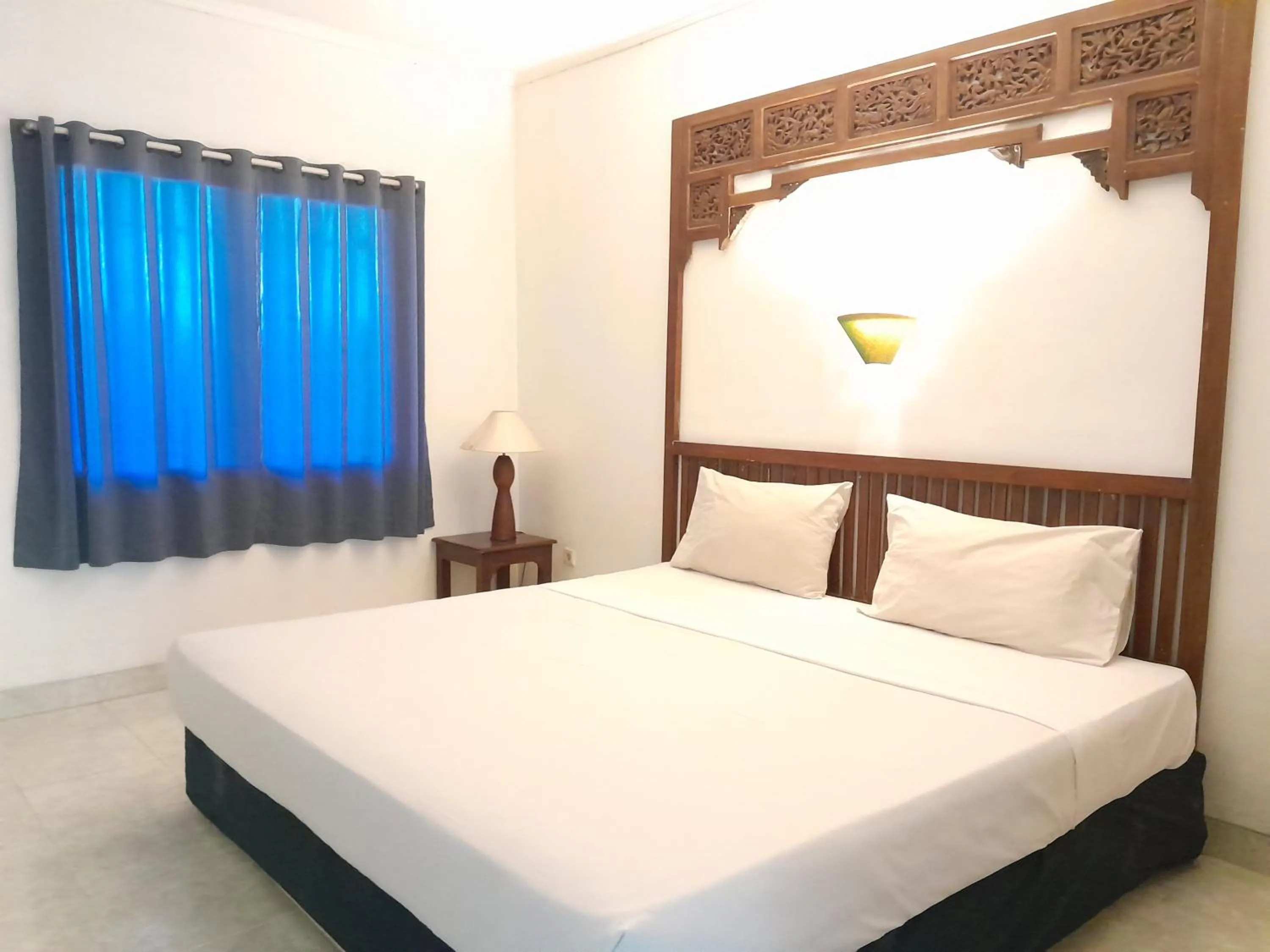 Bedroom in The Green Winotosastro Hotel Yogyakarta