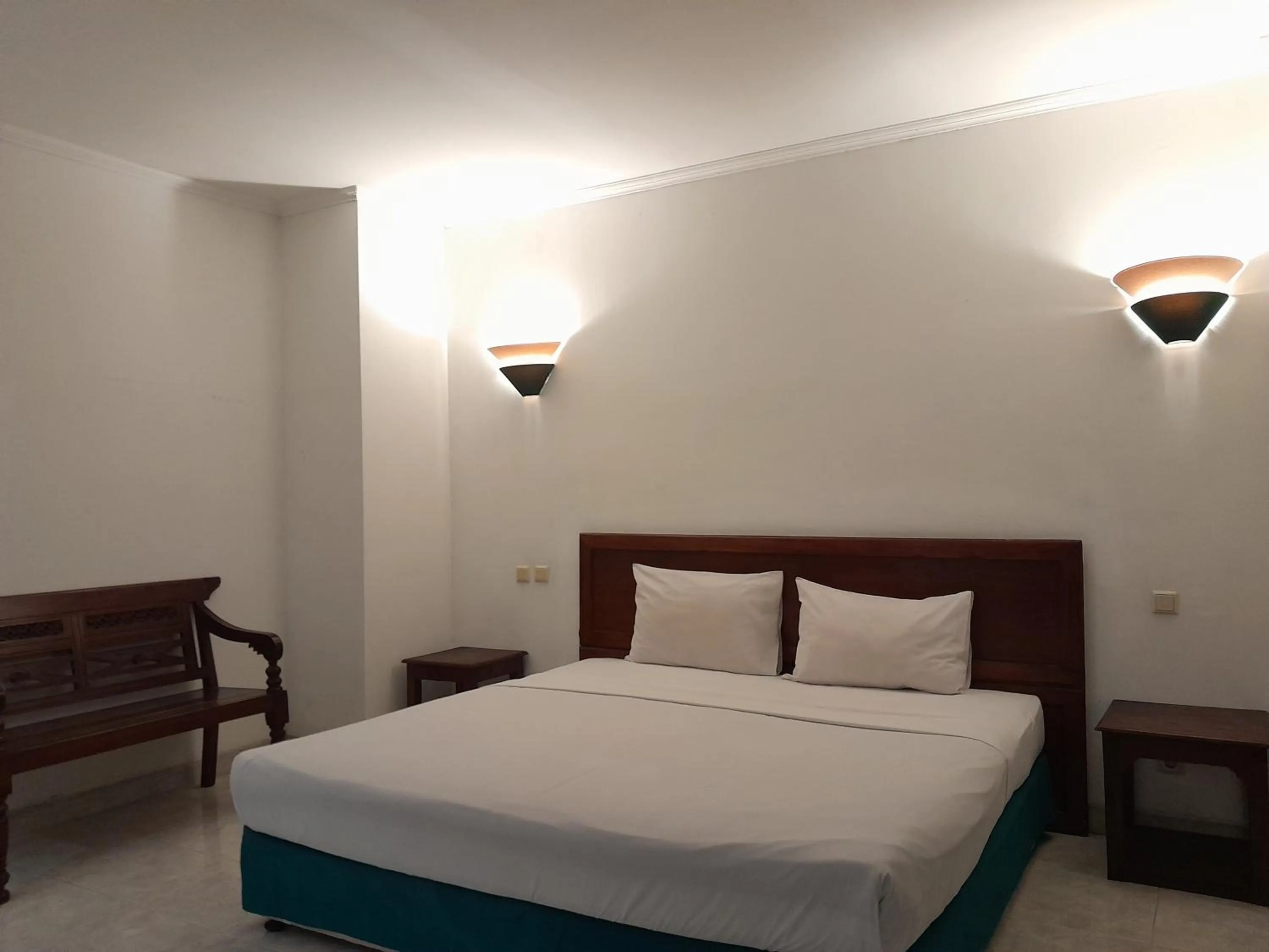 Bedroom in The Green Winotosastro Hotel Yogyakarta