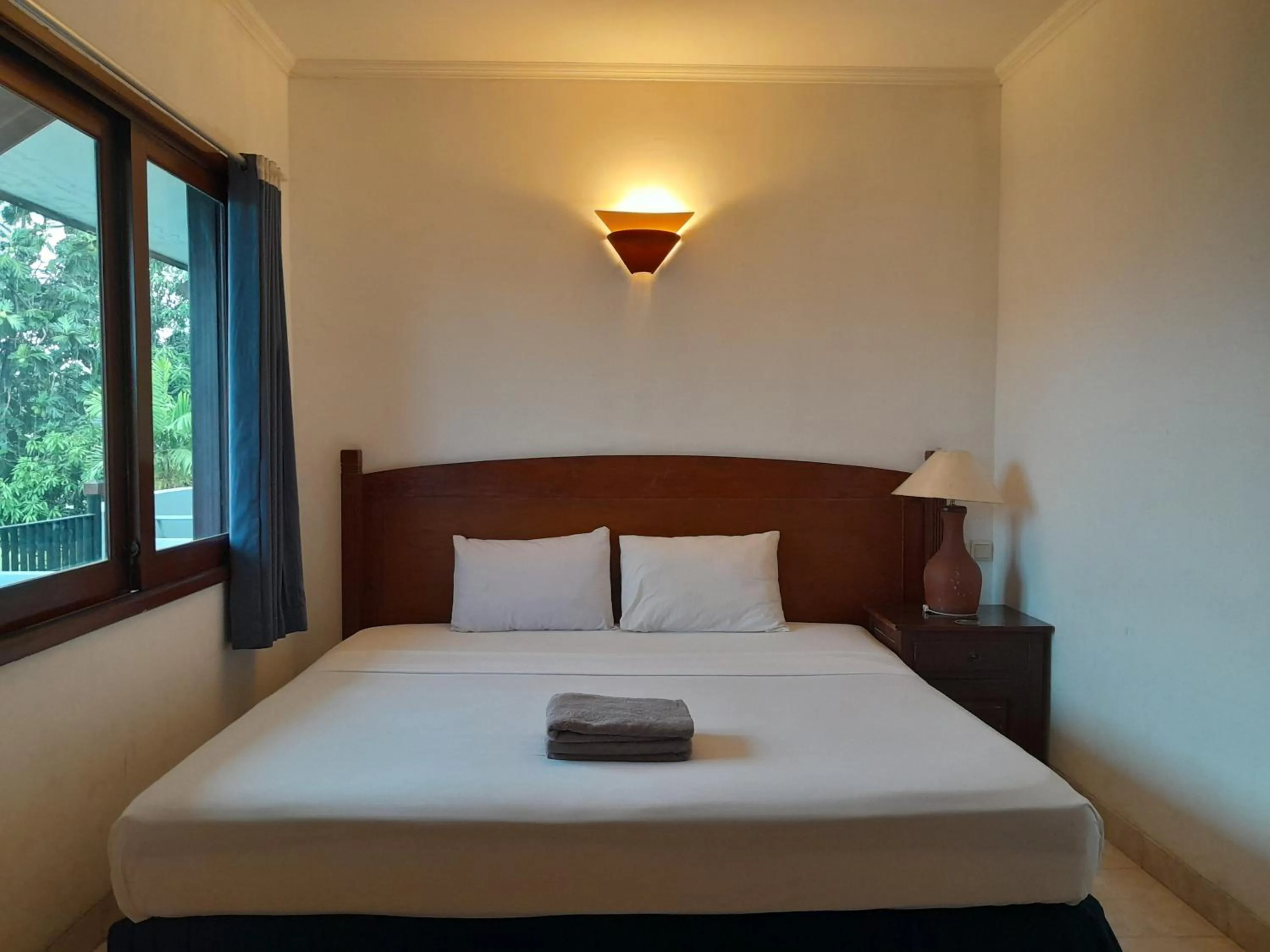 Bedroom in The Green Winotosastro Hotel Yogyakarta