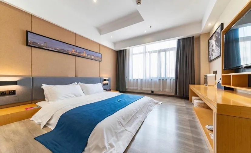 Bed in LanOu Hotel Yancheng Dafeng Yongtai Plaza