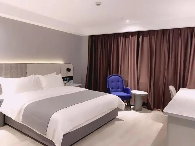 Bed in LanOu Hotel Yancheng Dafeng Yongtai Plaza