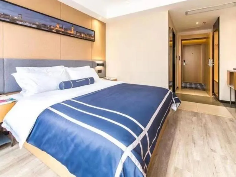 Bed in LanOu Hotel Yancheng Dafeng Yongtai Plaza
