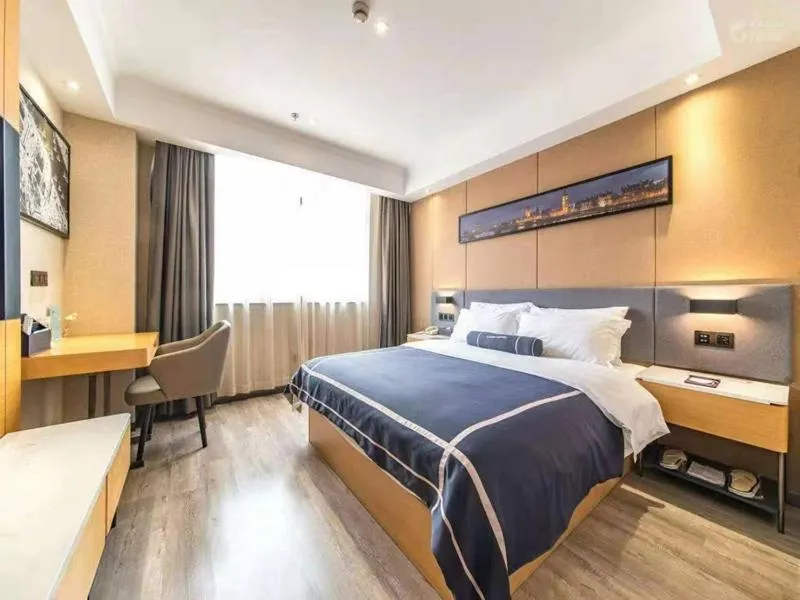 Bed in LanOu Hotel Yancheng Dafeng Yongtai Plaza