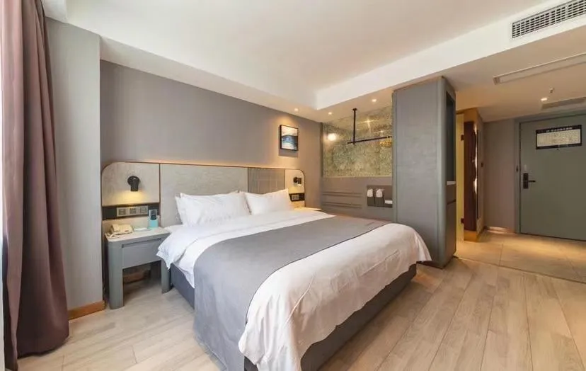 Bed in LanOu Hotel Yancheng Dafeng Yongtai Plaza