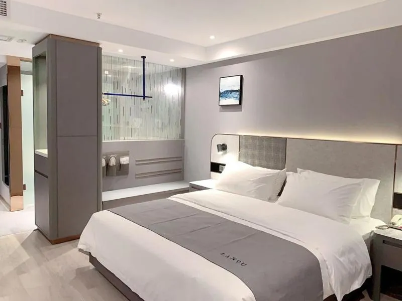 Bed in LanOu Hotel Yancheng Dafeng Yongtai Plaza
