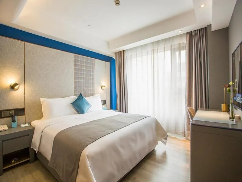 Bed in LanOu Hotel Zhenjiang Runzhou District Railway Station