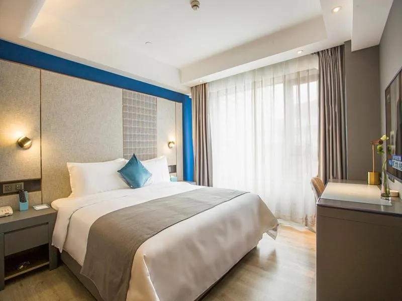 Bed in LanOu Hotel Zhenjiang Runzhou District Railway Station