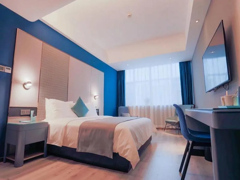 Bed in LanOu Hotel Taixing Wanda Plaza