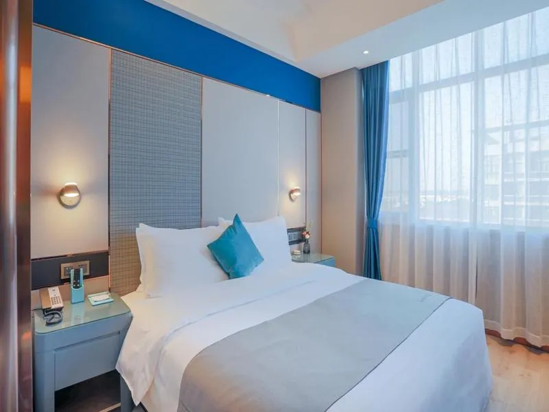 Bed in LanOu Hotel Taixing Wanda Plaza