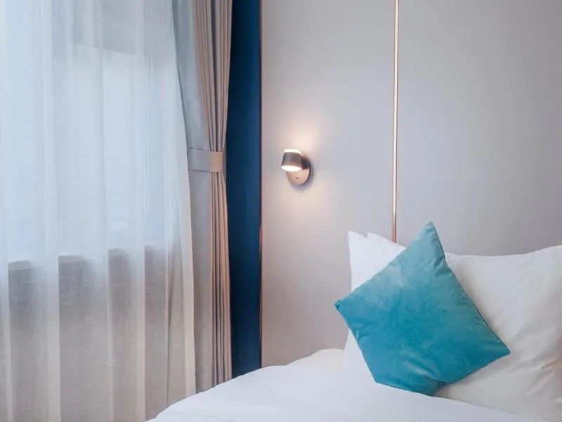 Bed in LanOu Hotel Taixing Wanda Plaza