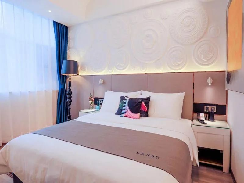 Bed in LanOu Hotel Taixing Wanda Plaza