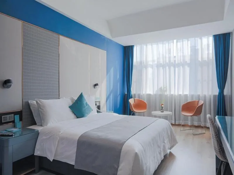 Bed in LanOu Hotel Taixing Wanda Plaza