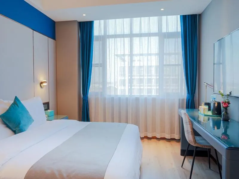 Bed in LanOu Hotel Taixing Wanda Plaza