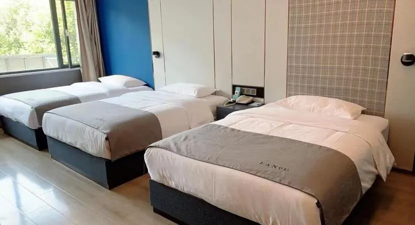 Bed in LanOu Hotel Linyi Lanling Agricultural Park