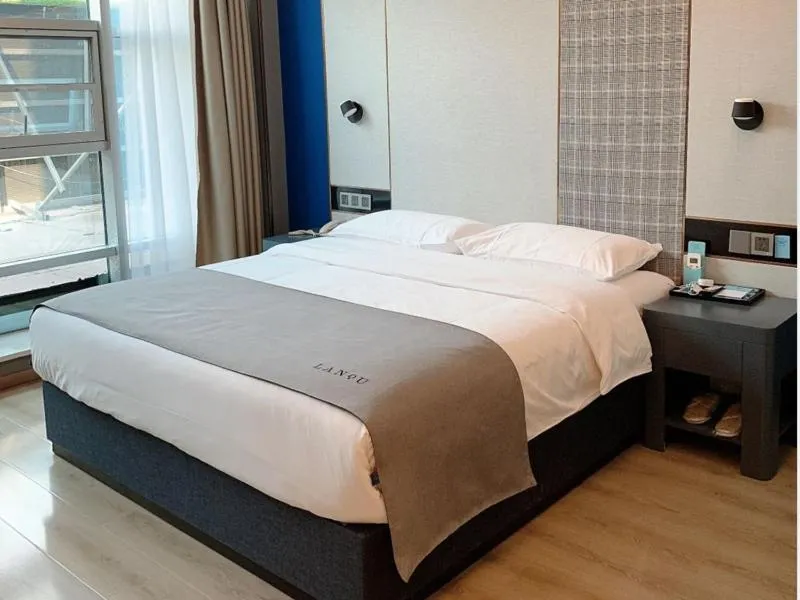 Bed in LanOu Hotel Linyi Lanling Agricultural Park