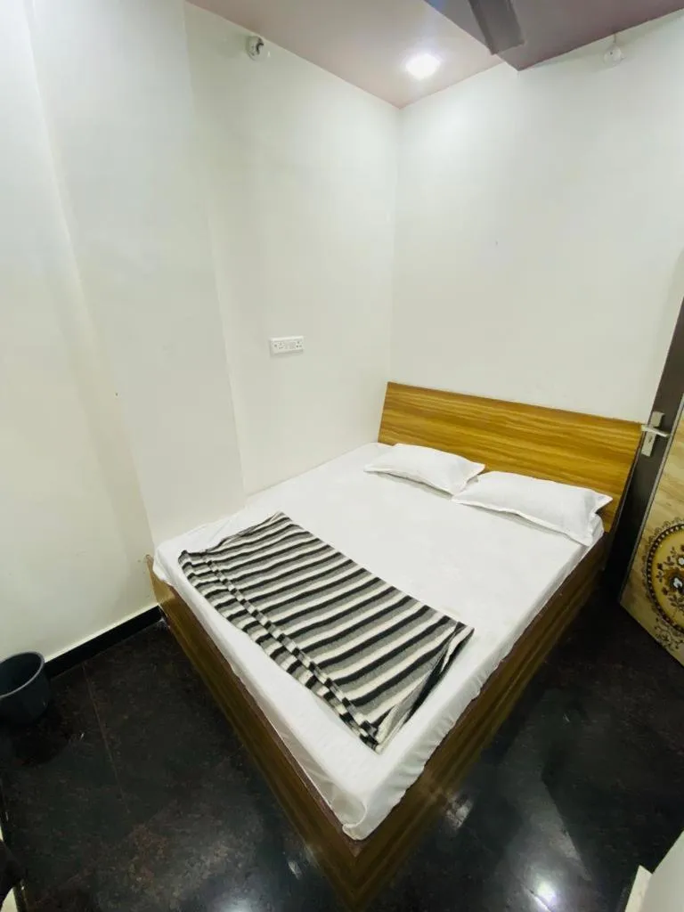 Bed in Hotel Arsh Palace