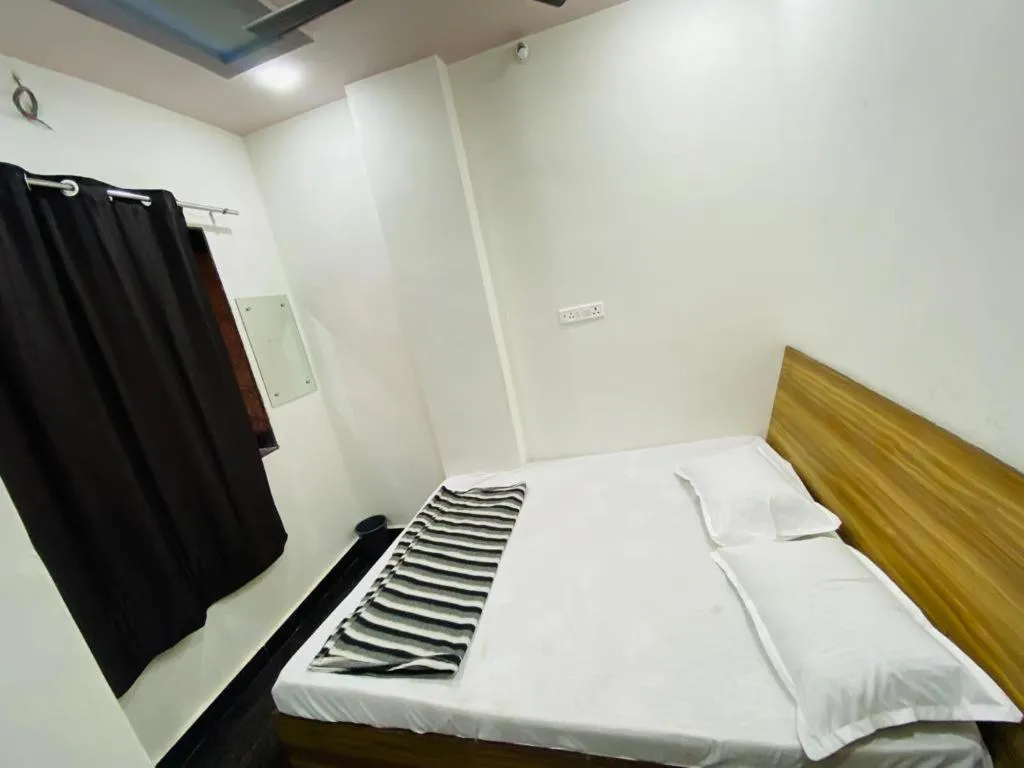 Bed in Hotel Arsh Palace