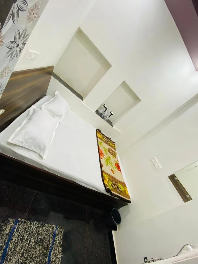 Bed in Hotel Arsh Palace