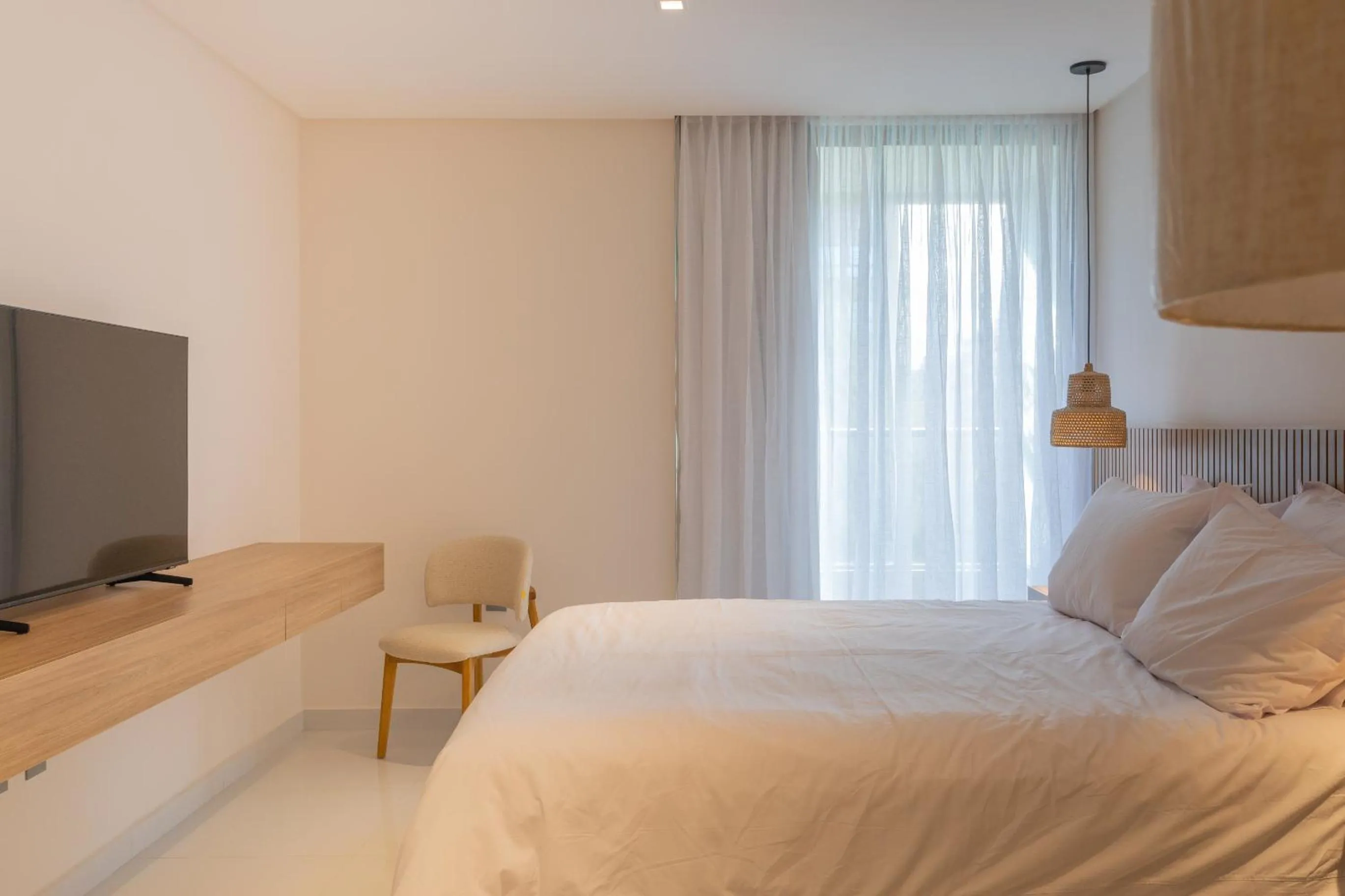 Bed in Acqua Residences Luxury Collection