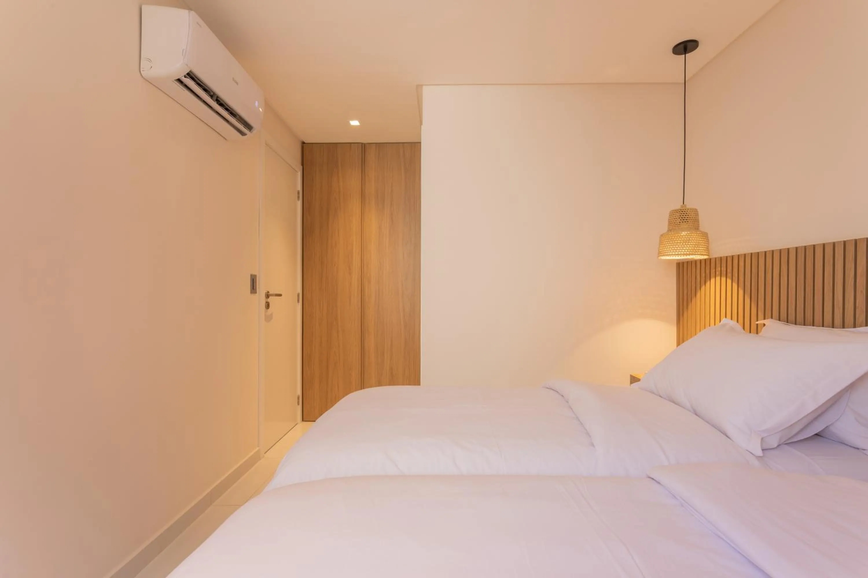 Bed in Acqua Residences Luxury Collection