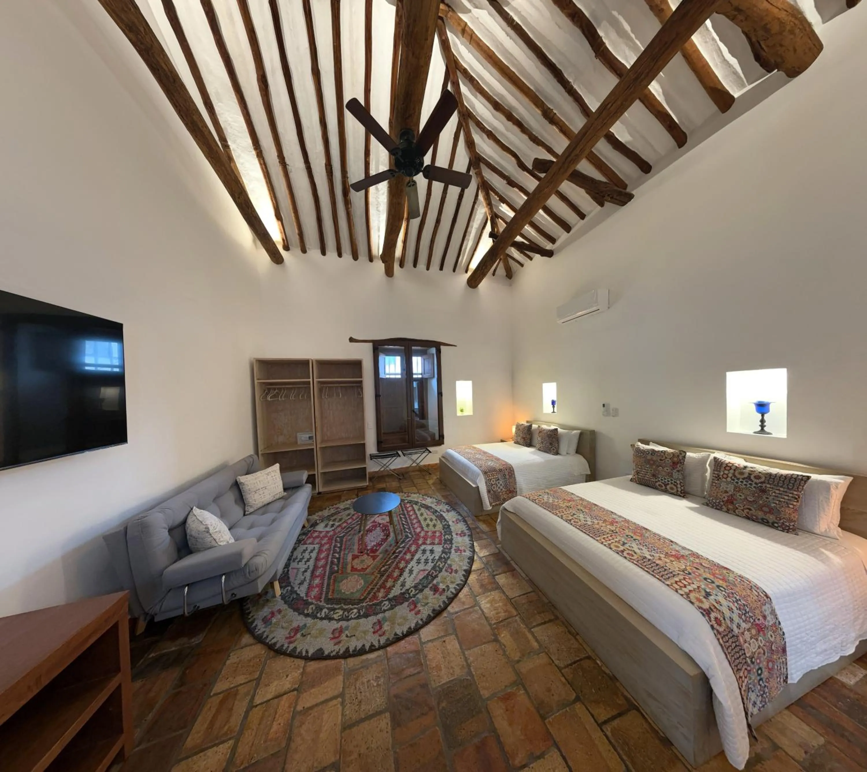 Family Room with Garden View in Santa Sofia Casa Boutique