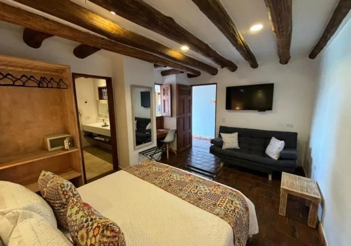 Triple Room with Pool View in Santa Sofia Casa Boutique