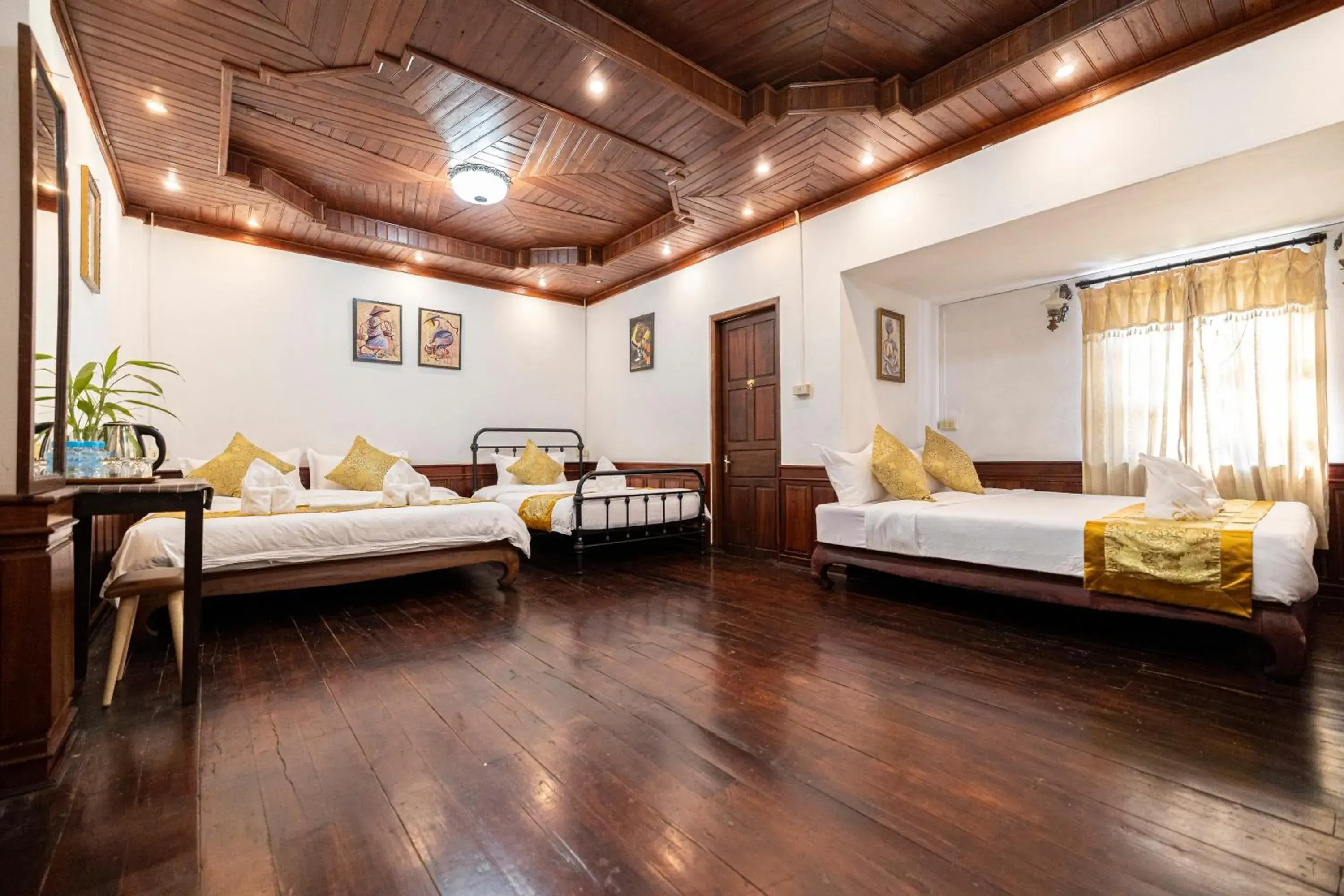 Bed in Mekong Chidlatda Villa Bed in Mekong Chidlatda Villa