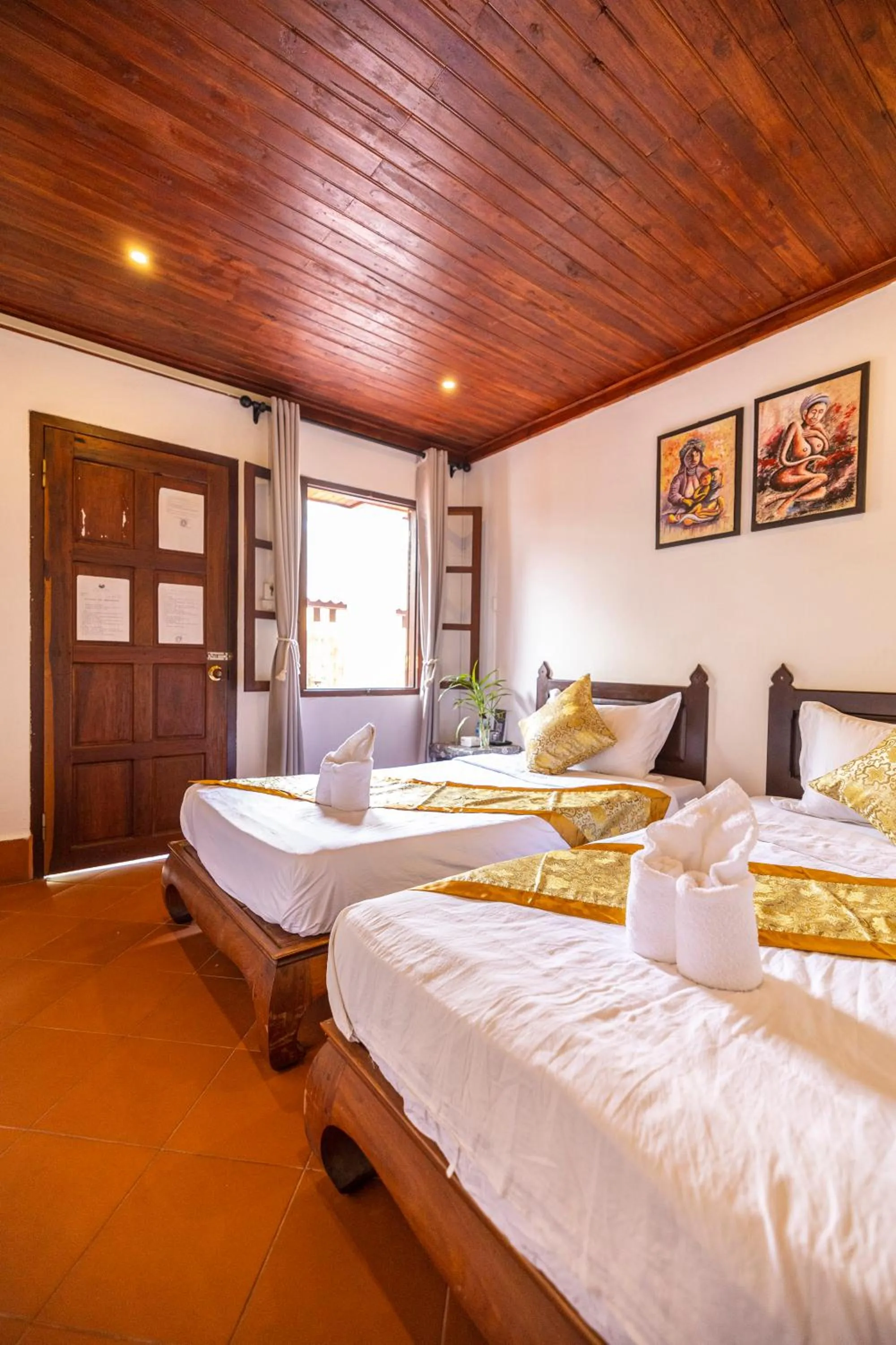 Bed in Mekong Chidlatda Villa