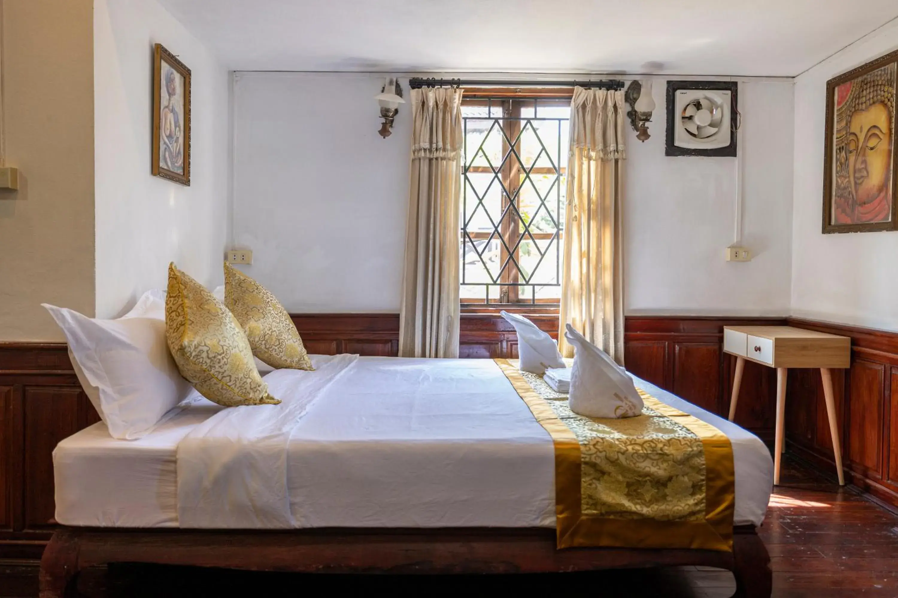 Bed in Mekong Chidlatda Villa Bed in Mekong Chidlatda Villa