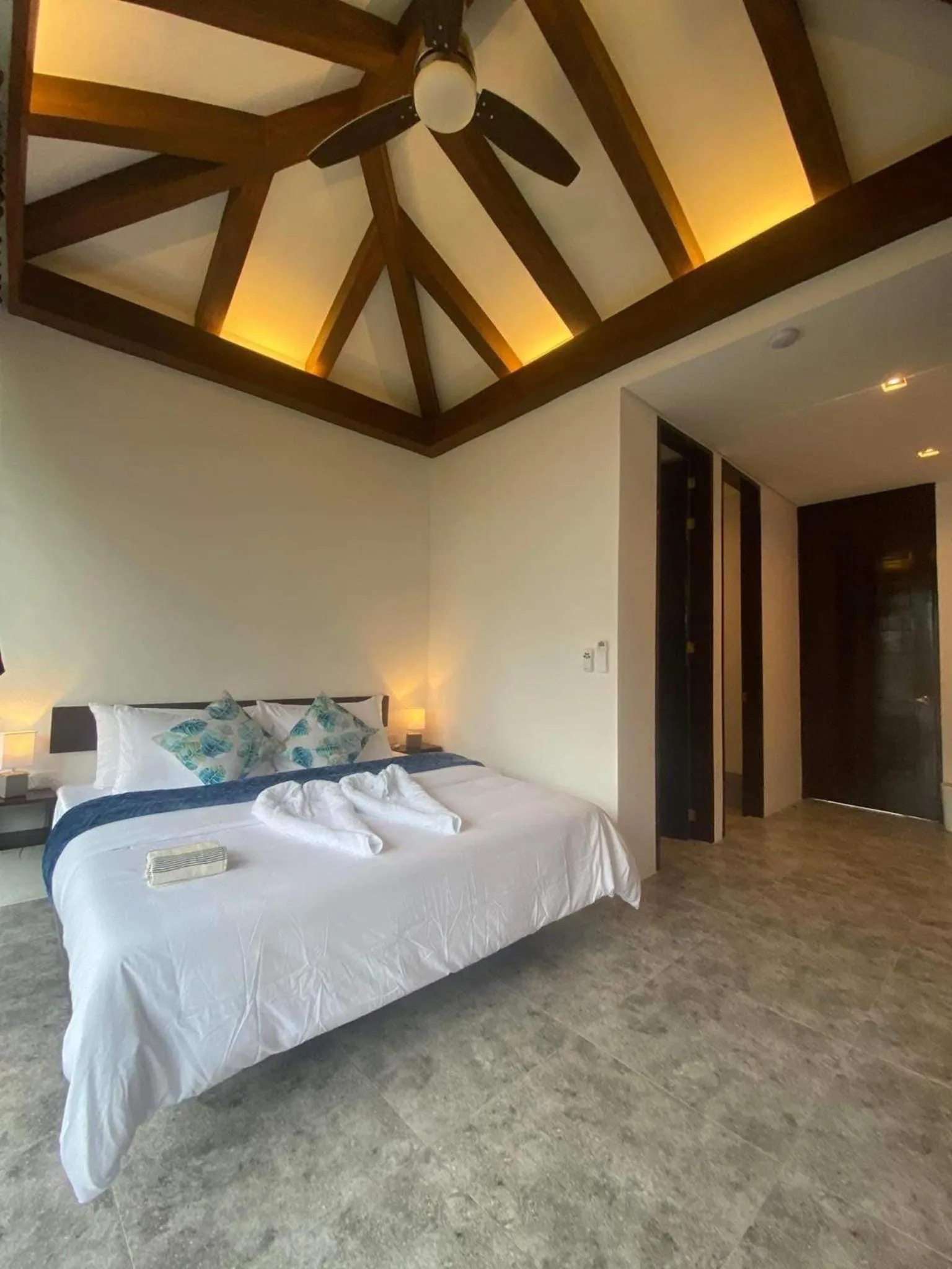 Bed in Amila Dive Beach Resort