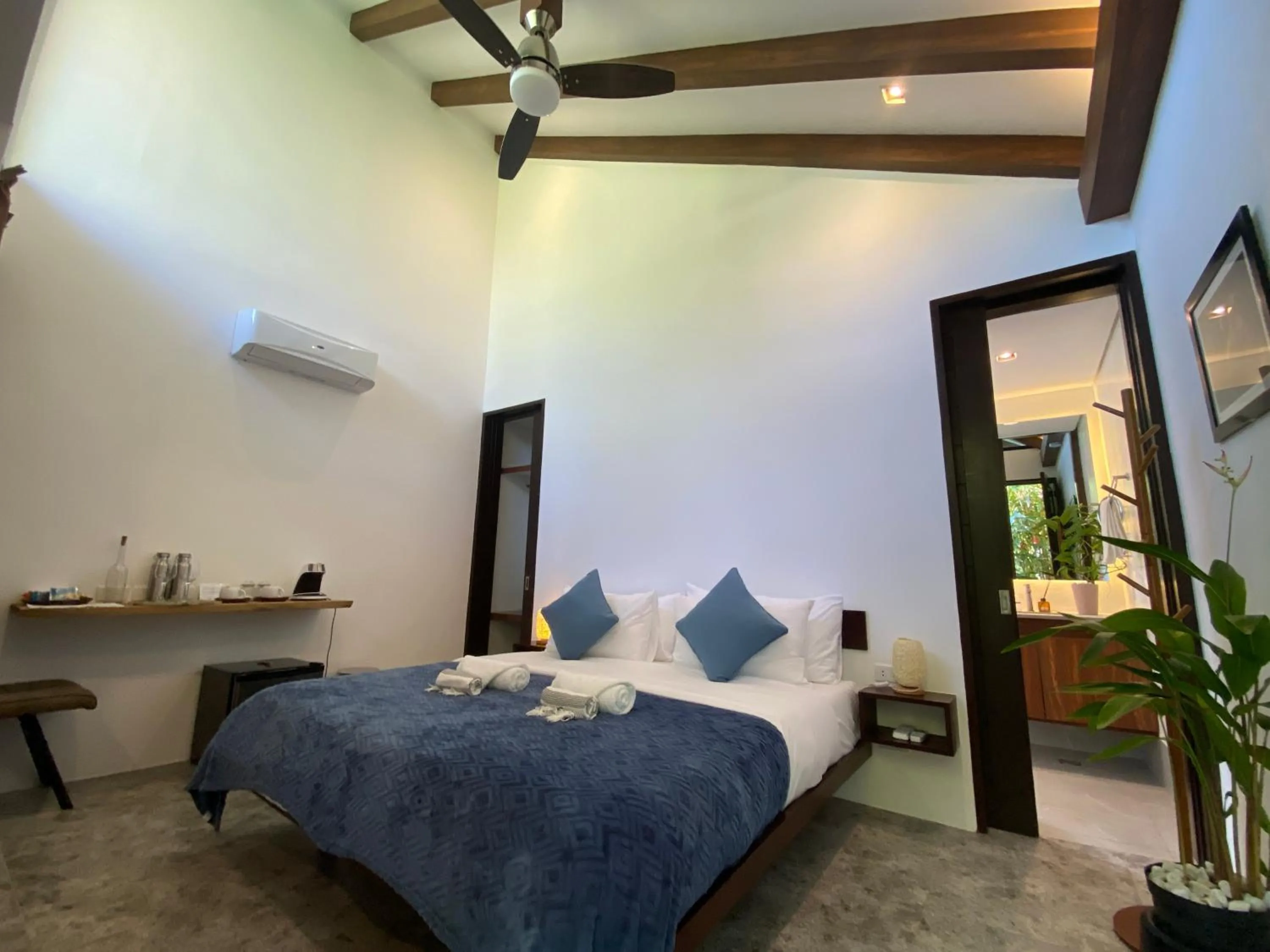 Bed in Amila Dive Beach Resort