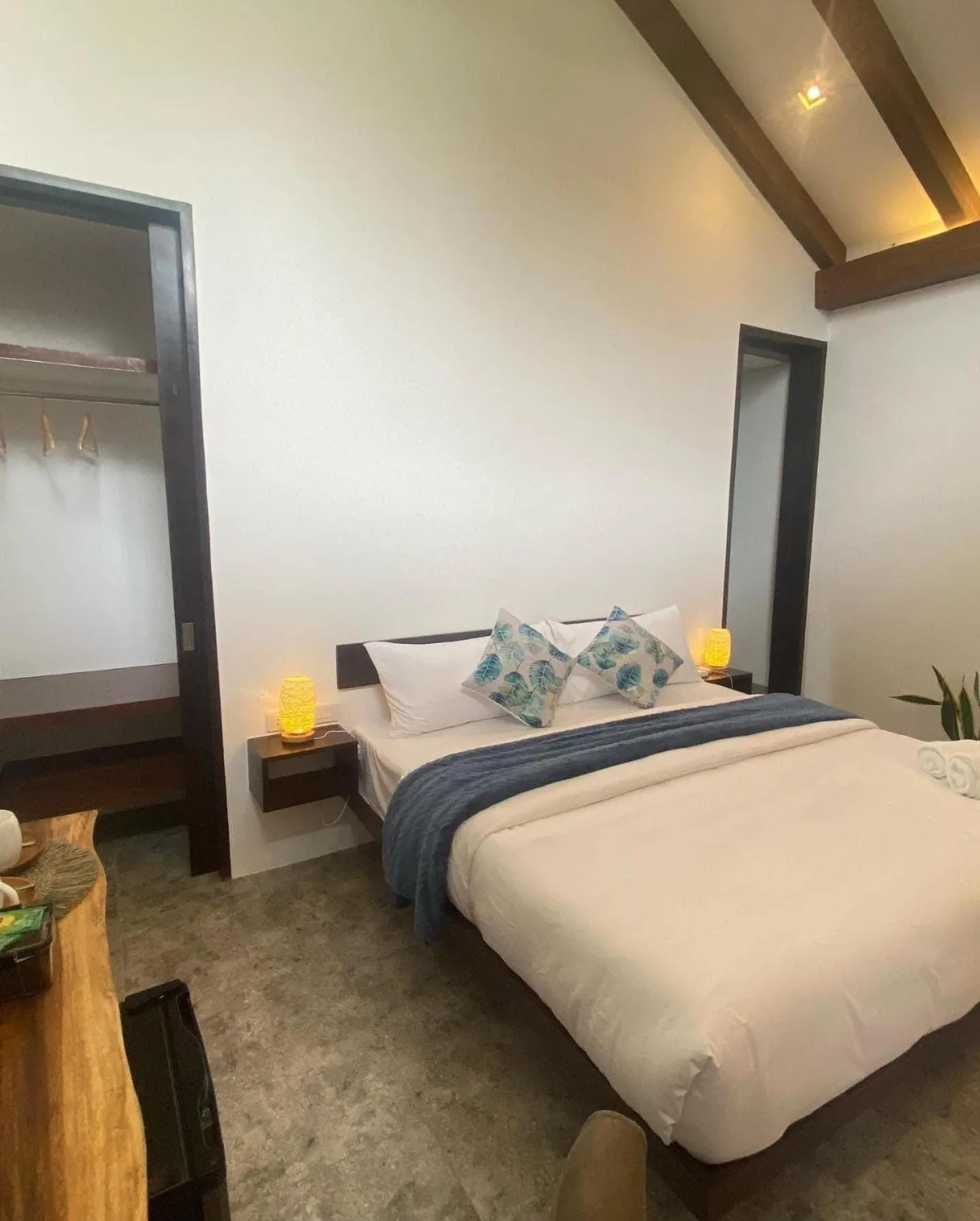 Bed in Amila Dive Beach Resort