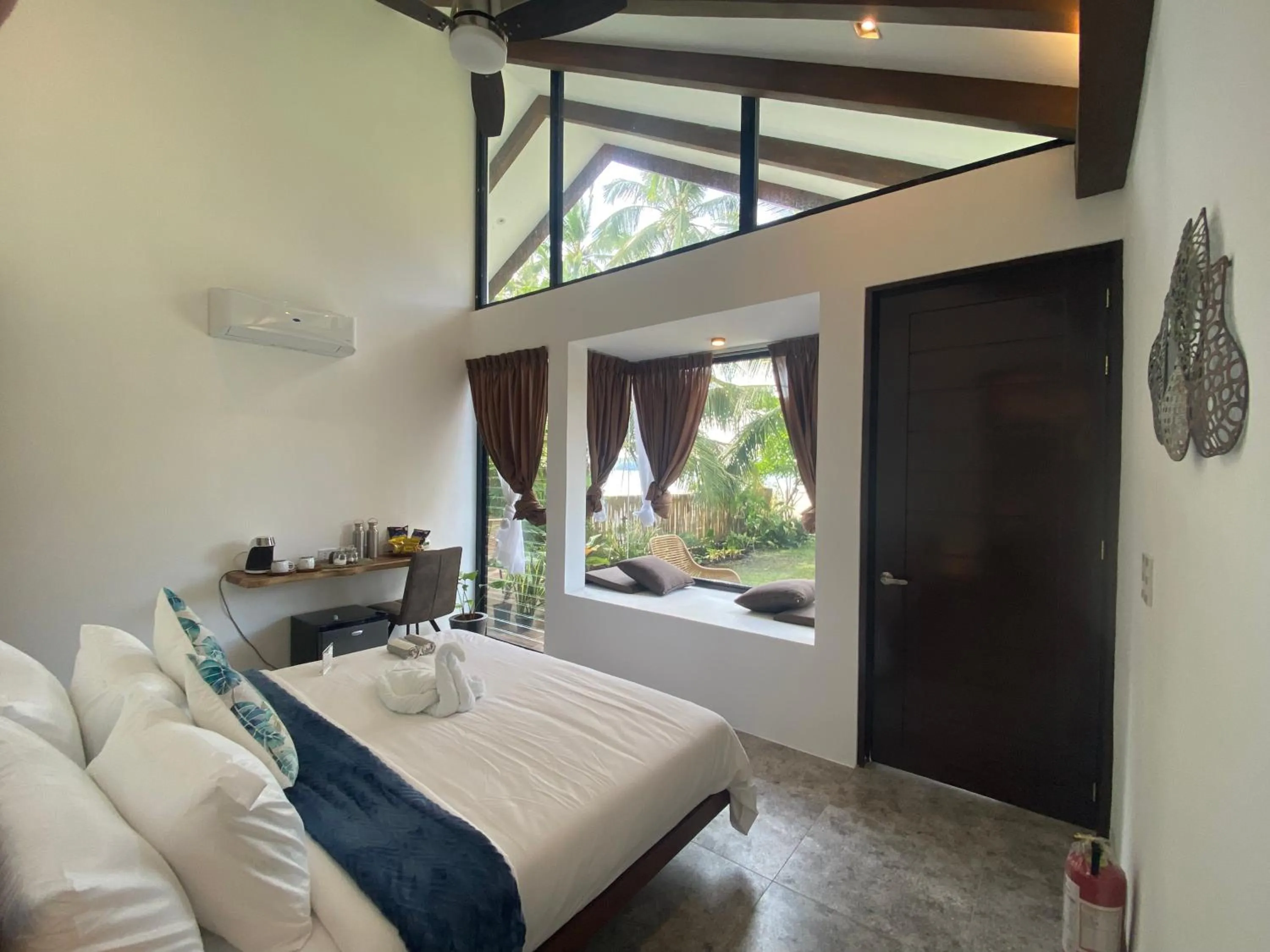 Bed in Amila Dive Beach Resort