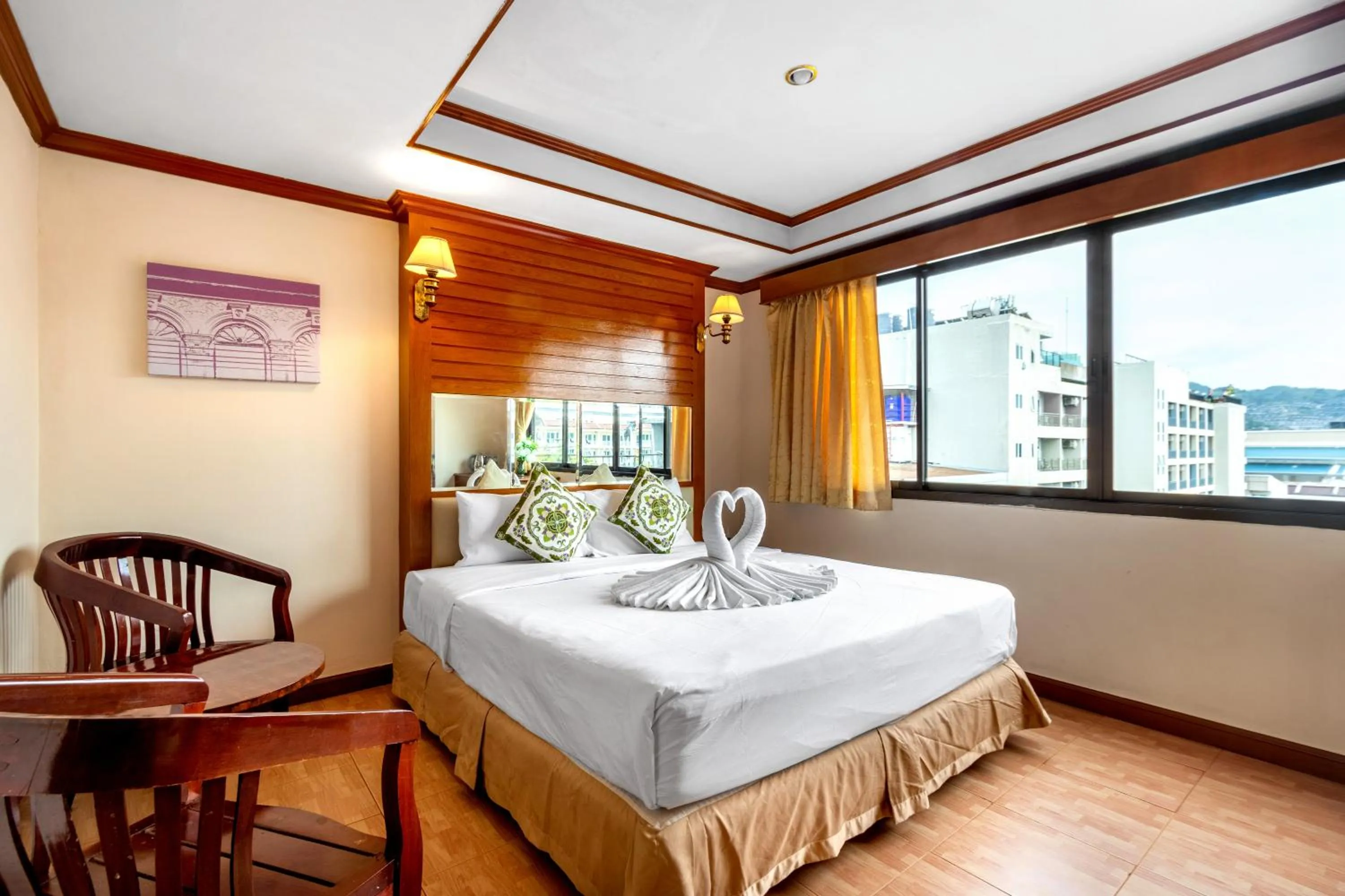 Seating area, Bed in JB Green Hotel Patong