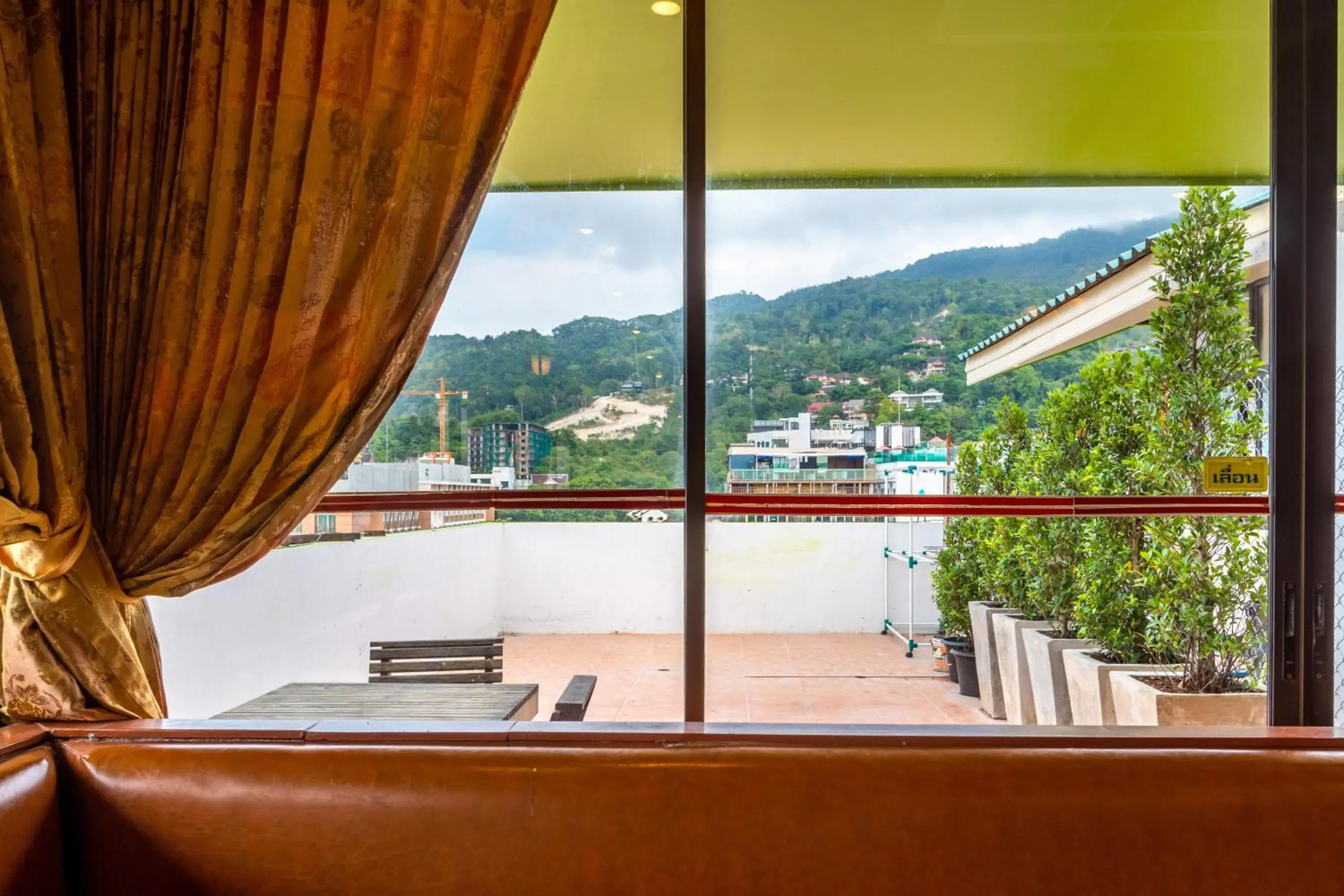 View (from property/room) in JB Green Hotel Patong View (from property/room) in JB Green Hotel Patong