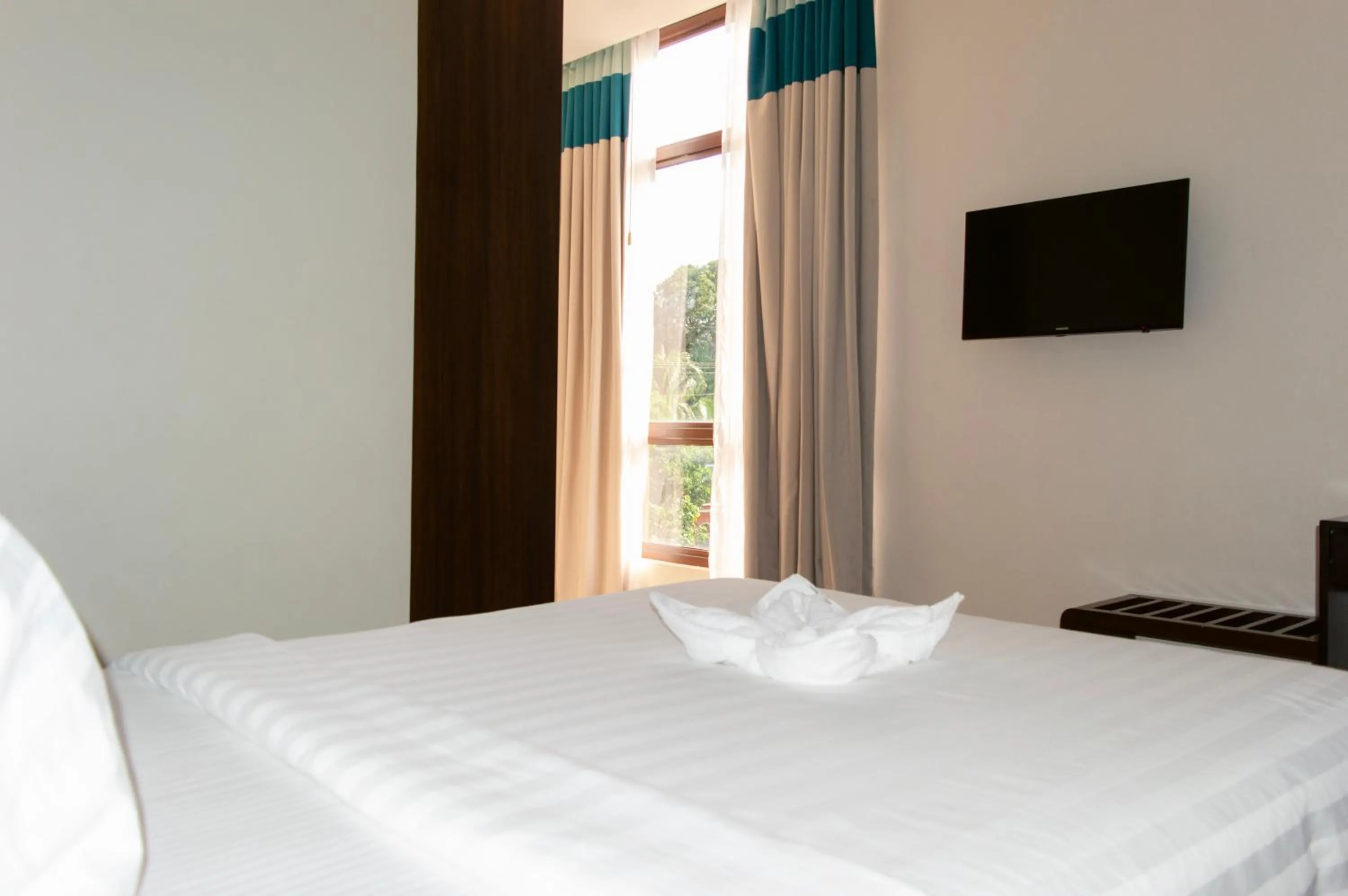 Bed in Costa Del Sol Resort Hotel