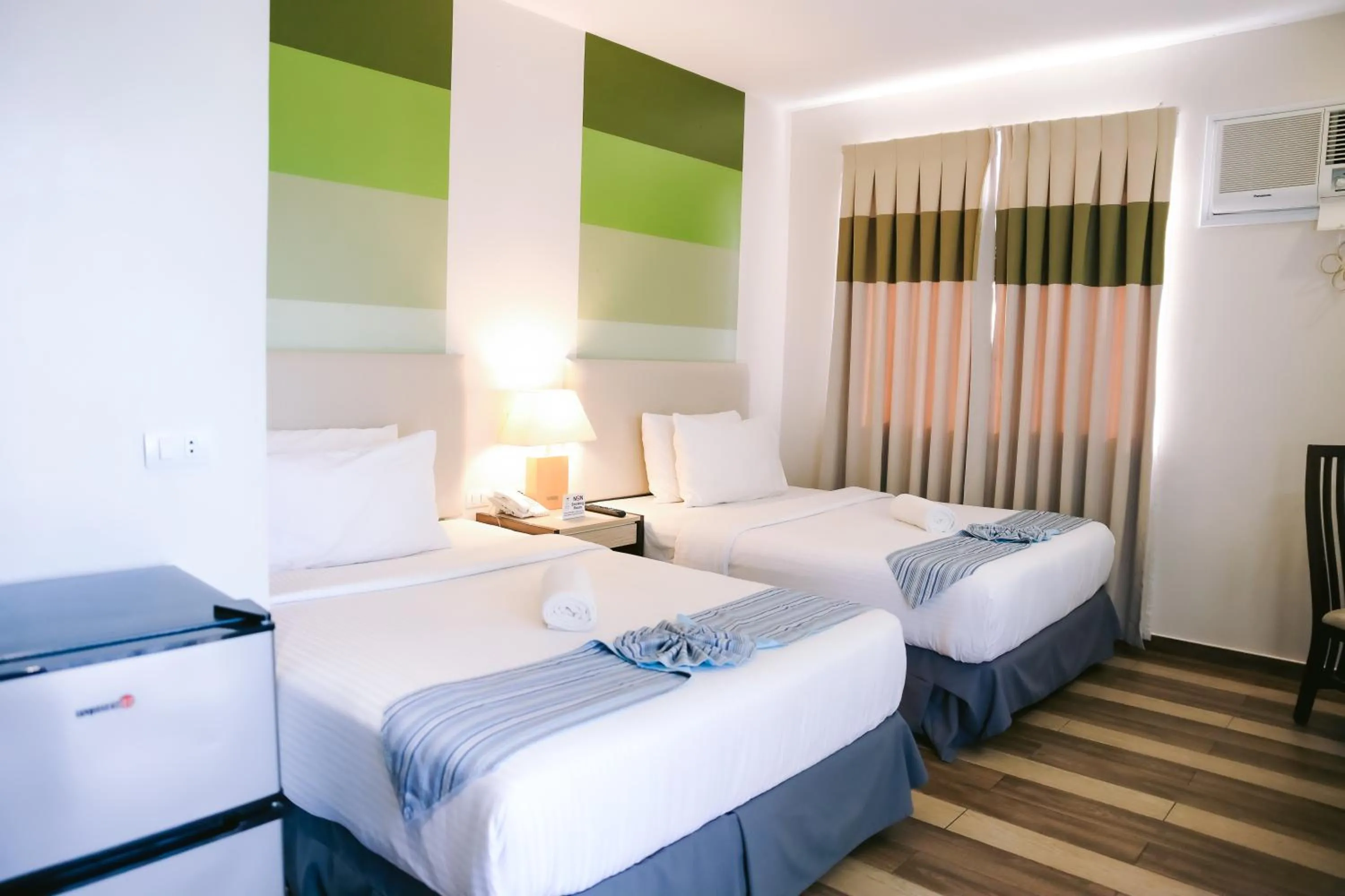 Bed in Costa Del Sol Resort Hotel
