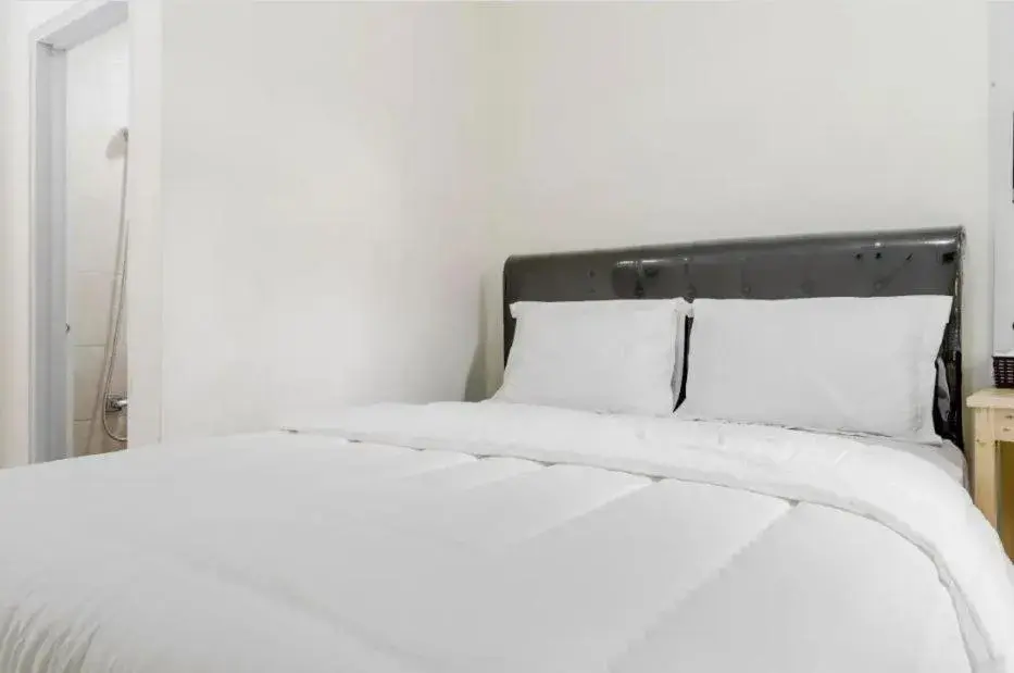 Photo of the whole room, Bed in Wisma Minongga By SPAZIE Photo of the whole room, Bed in Wisma Minongga By SPAZIE