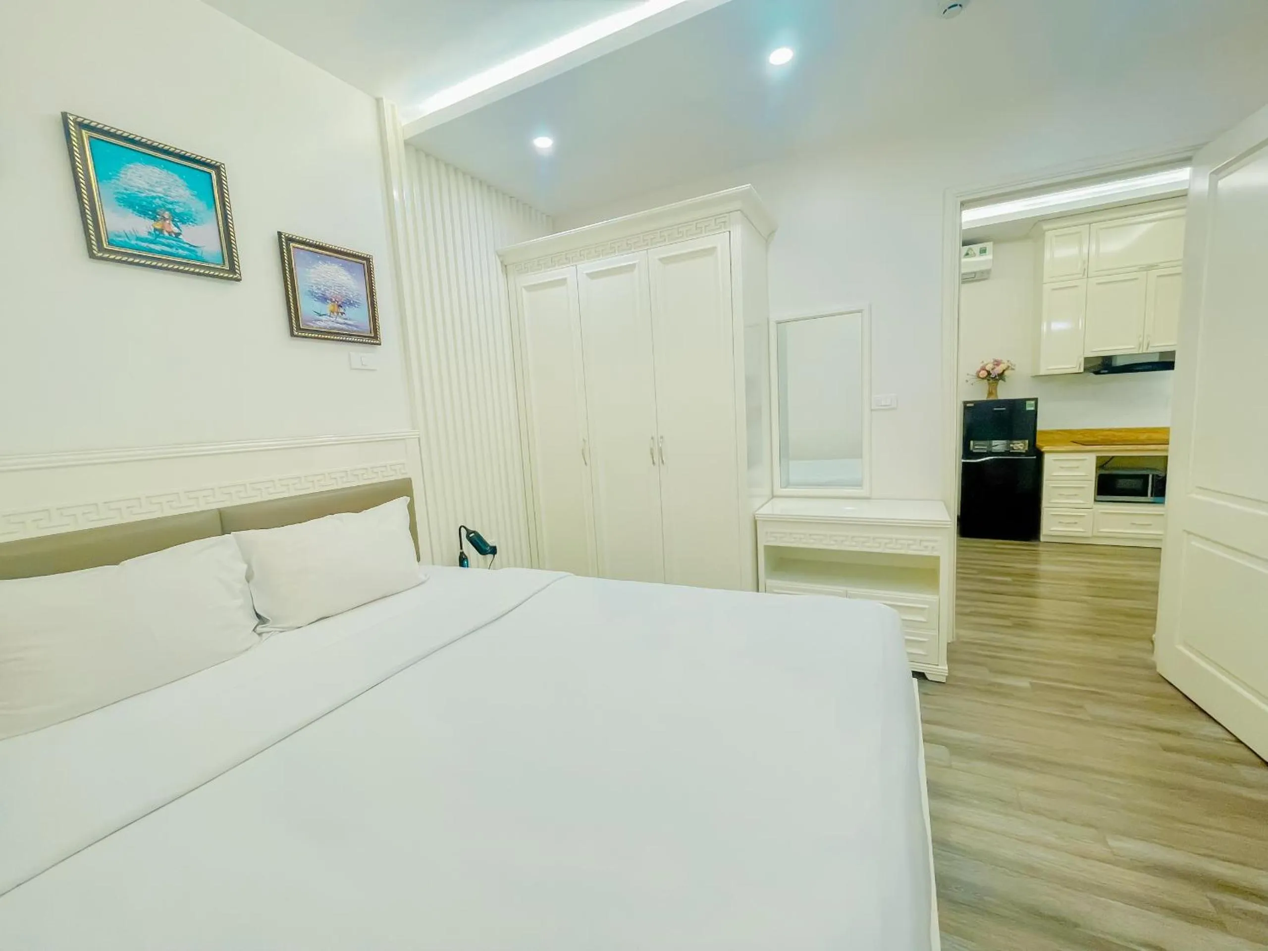 Bed in Rosee Apartment Hotel