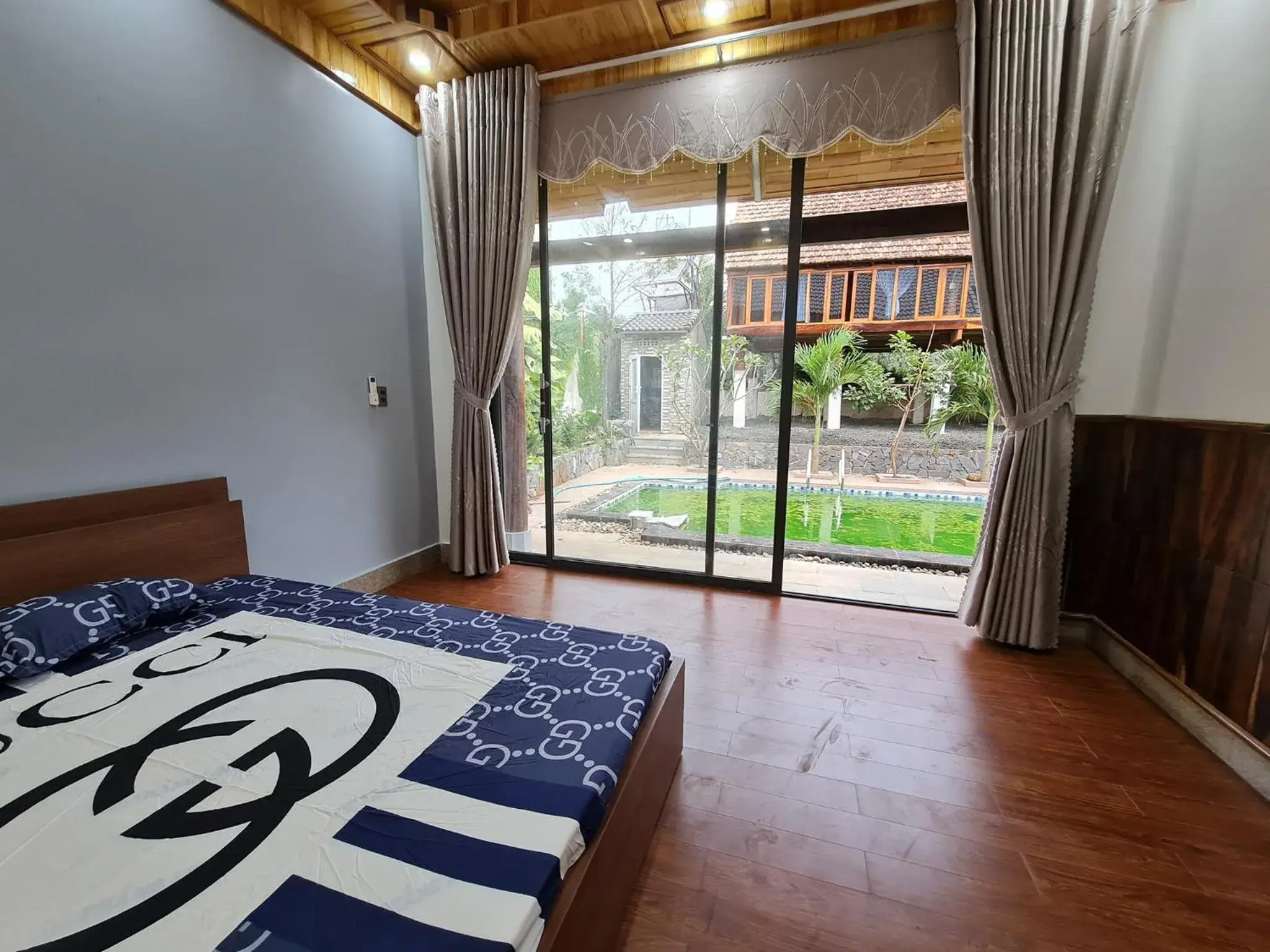 Bedroom, Bed in T'Farmstay villa and resort Buon Ma Thuot City Bedroom, Bed in T'Farmstay villa and resort Buon Ma Thuot City