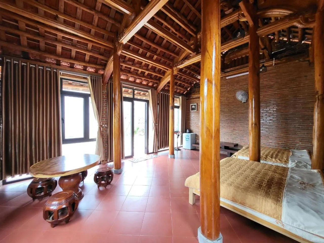 Bed in T'Farmstay villa and resort Buon Ma Thuot City