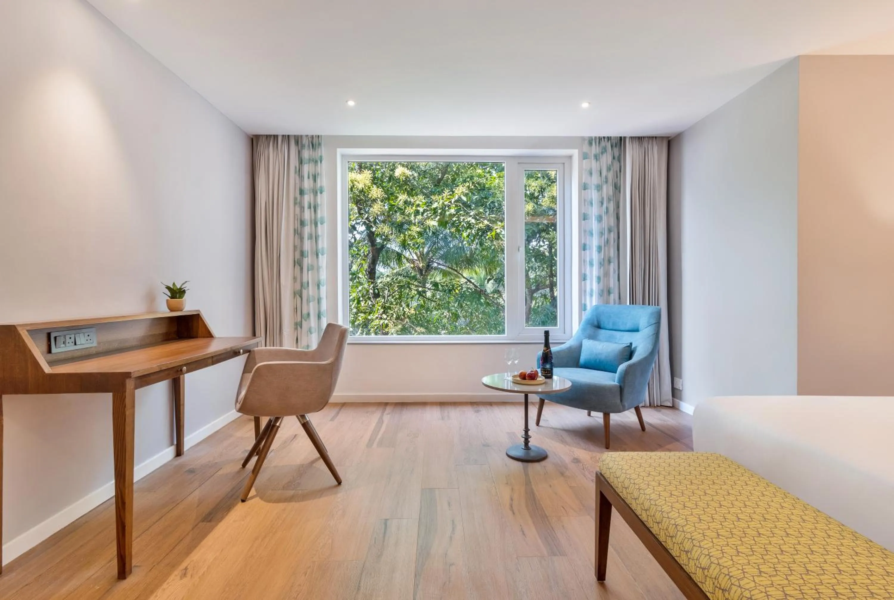 Seating area, Bed in Aiden by best Western Vagator Goa