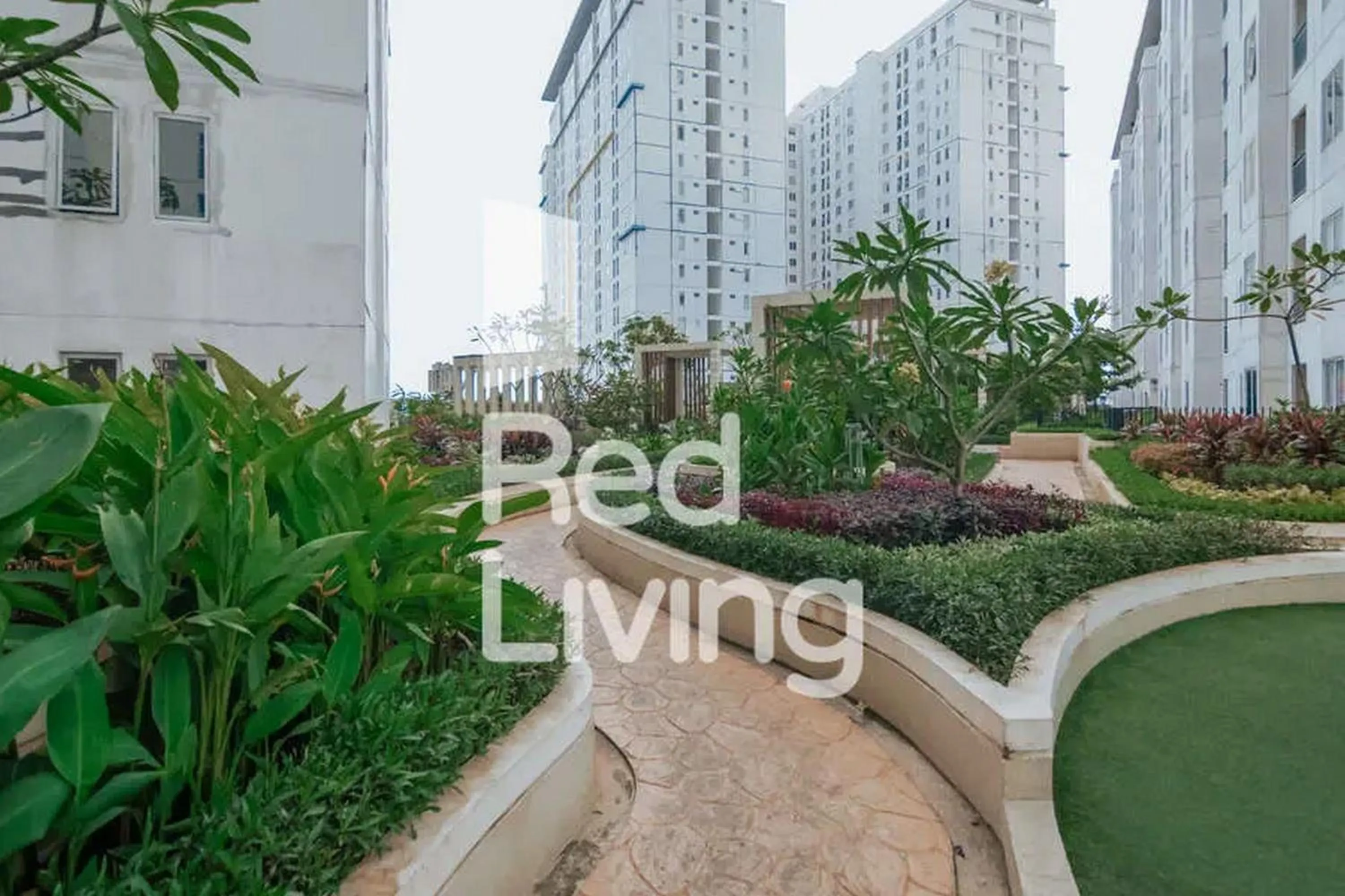 Garden in RedLiving Apartemen Bassura City - Vina Tan Tower Flamboyan
